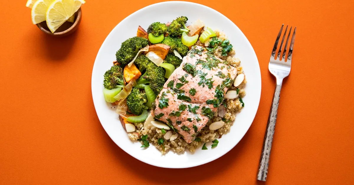 Baked salmon with broccoli and quinoa — omega-3 rich foods that support gum health, Royal Palm Beach FL